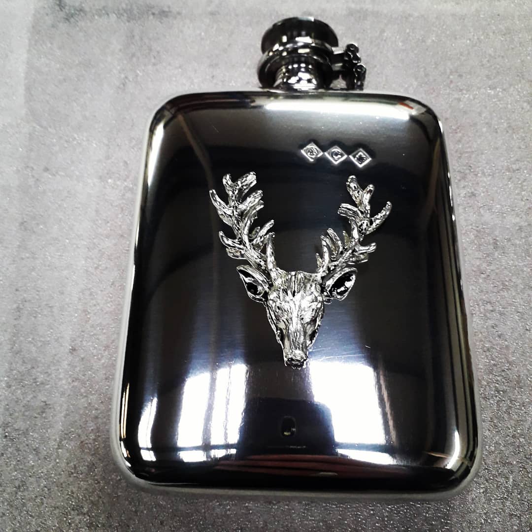F133 6oz stamped flask with Stag head badge